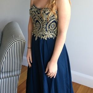 Long navy prom dress with sequin detailed top